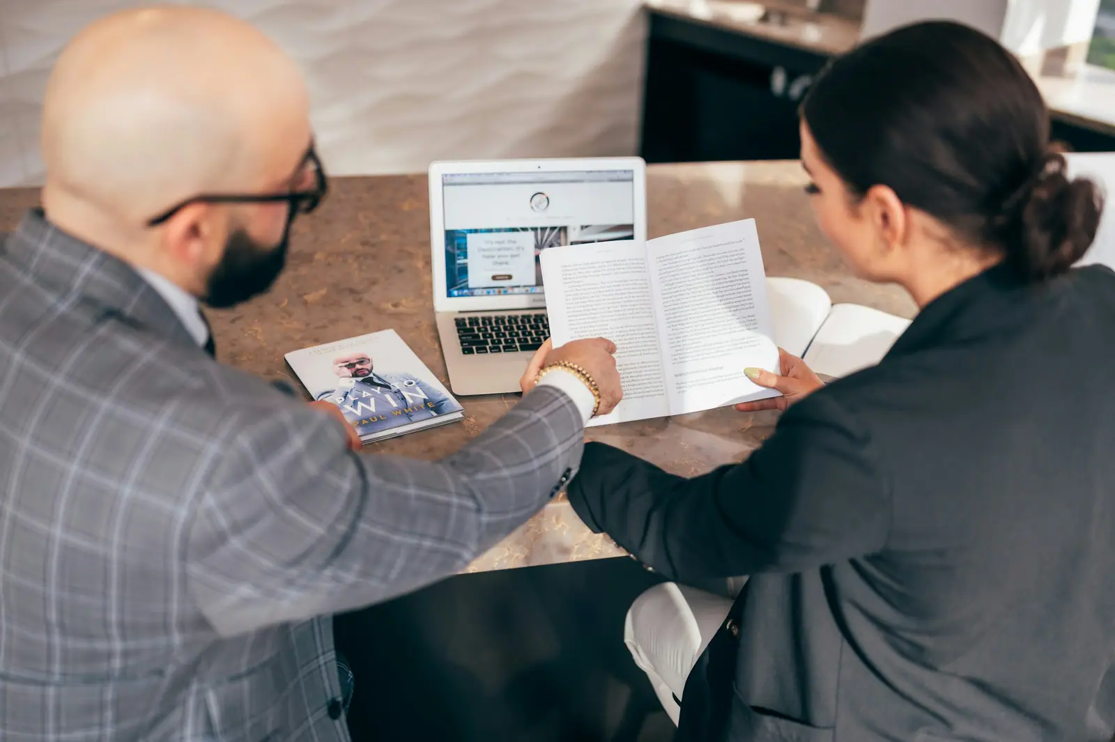 Client and advisor reviewing documents