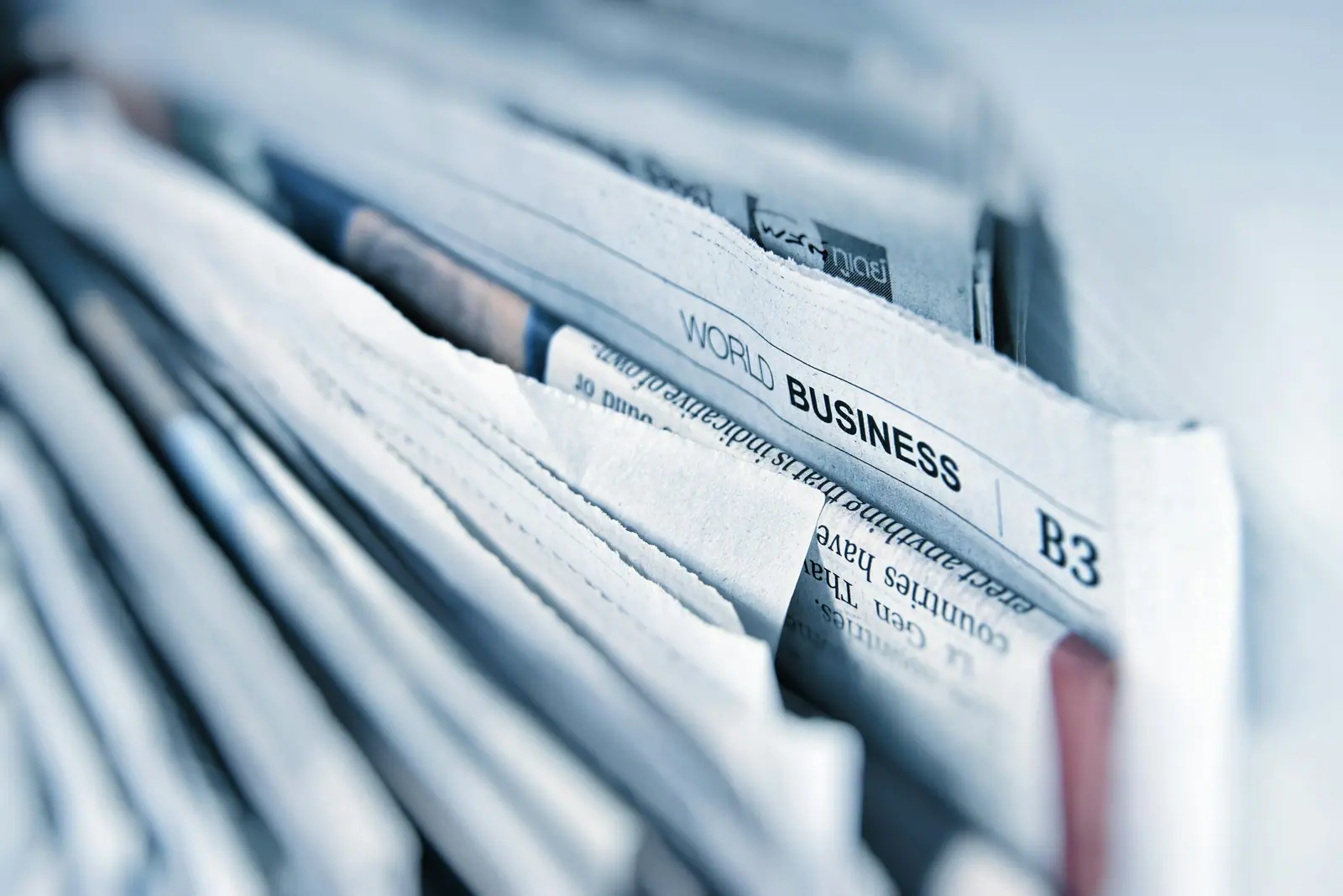 Folded business newspapers