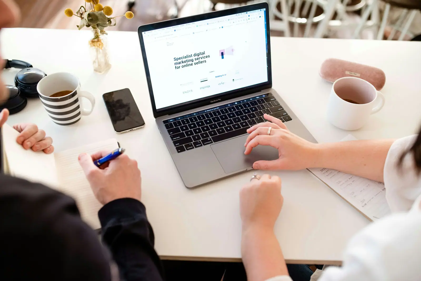 Reviewing a new professional website on a laptop