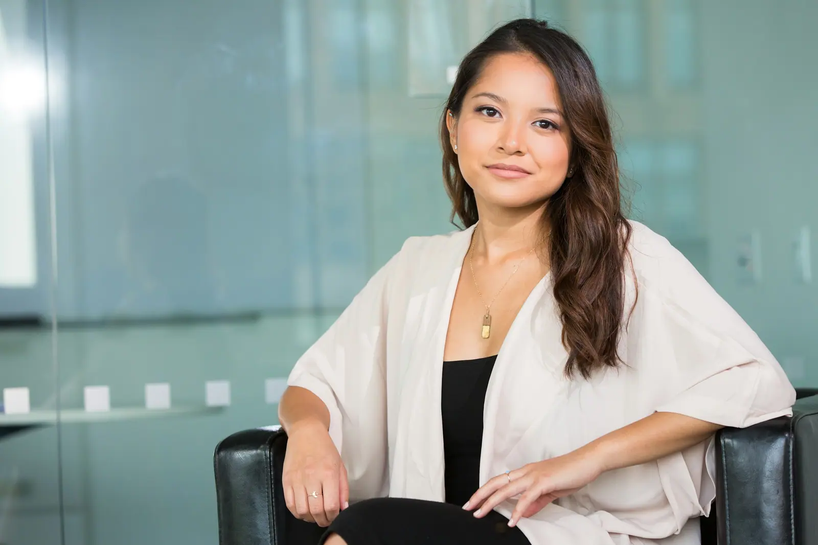Confident consultant seated in a modern office